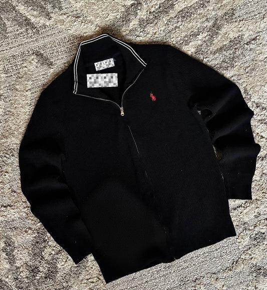 Sweater features a full zip