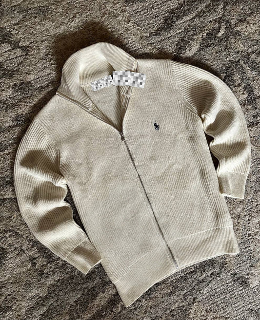 Sweater features a full zip