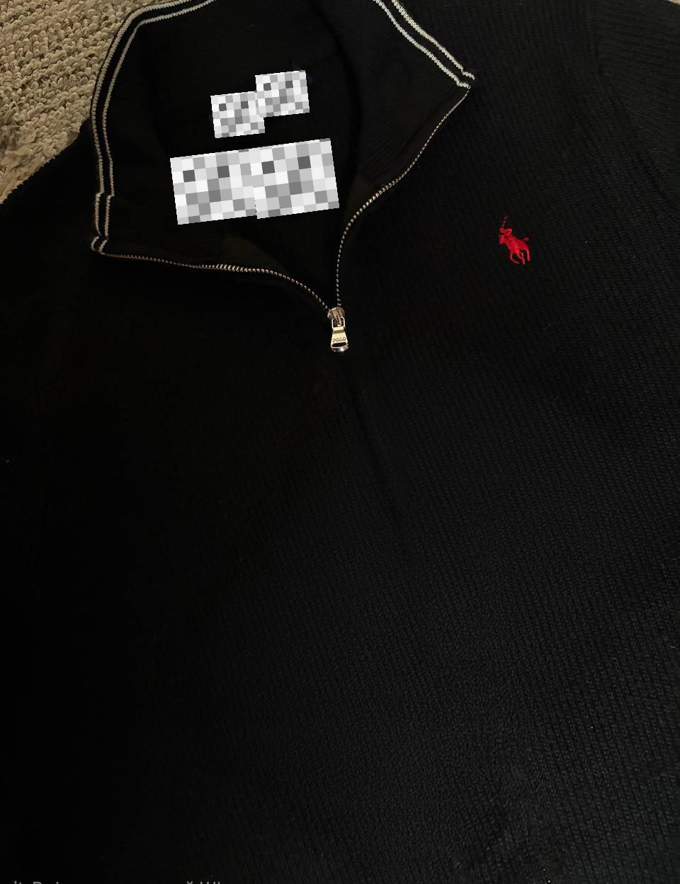 Sweater features a full zip